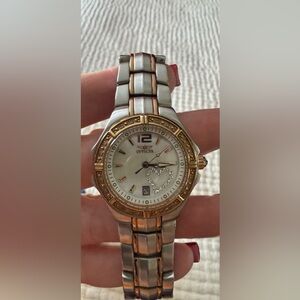 Women's Invicta tritnite watch. Model # 0694.